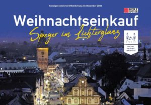 Titelseite der weihnachtseinkaufs-Beilage der Schwetzinger Zeitung mit dem Foto der beleuchteten Maximilianstraße Speyer